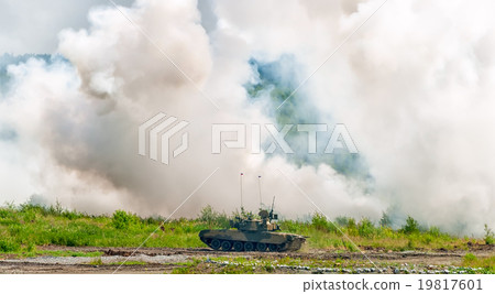 Russian tank T-80 making smoke screen from enemy Russian tank T-80 making smoke screen from enemy 19817601