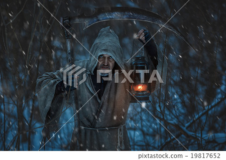 Close-up portrait of a grim reaper with scythe. 19817652