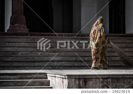 Sweeping the floor 19823619