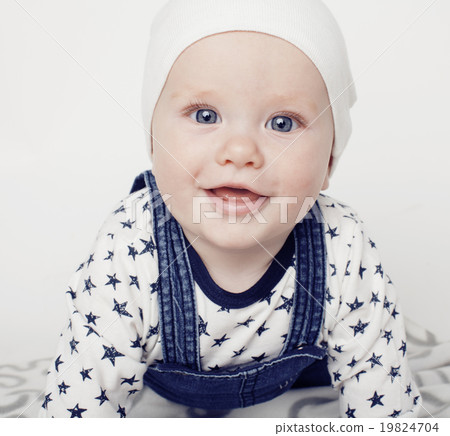 little cute baby toddler on carpet isolated close 19824704
