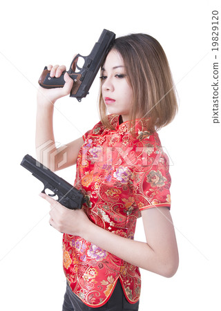 Beautiful woman with gun 19829120