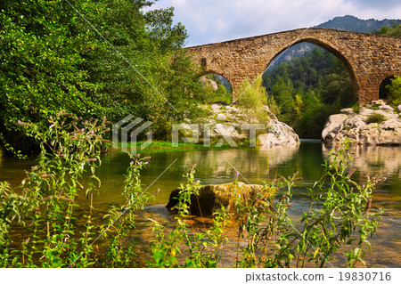Medieval stone bridge over Llobregat river in Pyrenees Medieval stone bridge over Llobregat river in Pyrenees 19830716