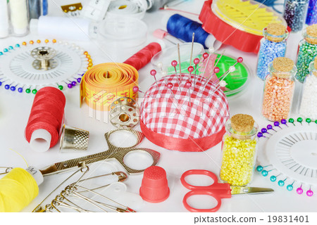 Sewing kit on white background 19831401