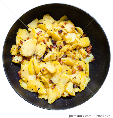fried potatoes with pork cracklings in round pan 19831676
