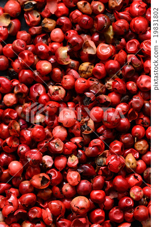 Pink peppercorns close up 19831802
