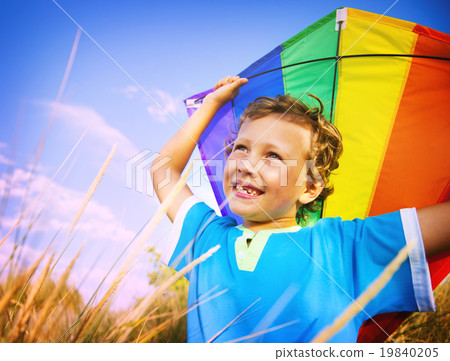 Cheerful Young Boy Playing Kite Outdoors Concept 19840205