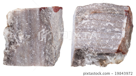 two pieces of Rhyolite mineral stone isolated two pieces of Rhyolite mineral stone isolated 19843972