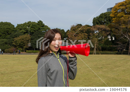 A young woman with megaphone A young woman with megaphone 19844576