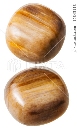 two tigers eye gemstones isolated on white 19845118