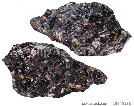 two pieces of Obsidian mineral stone isolated 19845128
