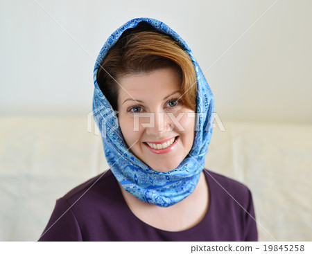 Portrait of a woman in headscarf. Russian style. Portrait of a woman in headscarf. Russian style. 19845258