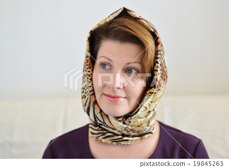 Portrait of a woman in headscarf. Russian style. Portrait of a woman in headscarf. Russian style. 19845263
