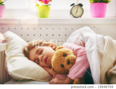 girl sleeping in the bed 19846789