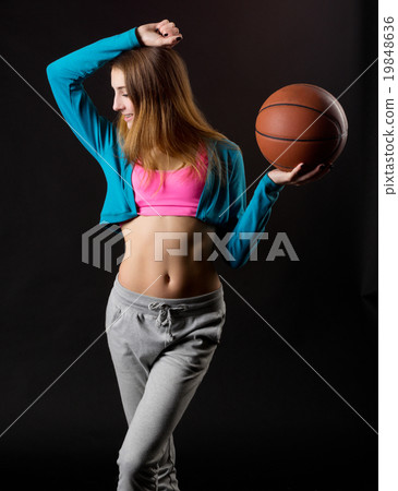Young girl with basketball ball Young girl with basketball ball 19848636