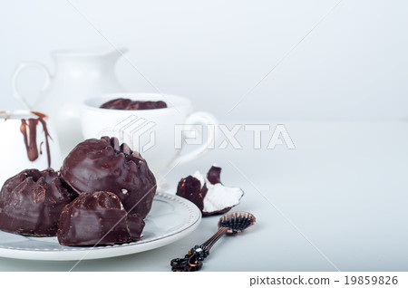 Chocolate  zephyr and cup of coffee  19859826