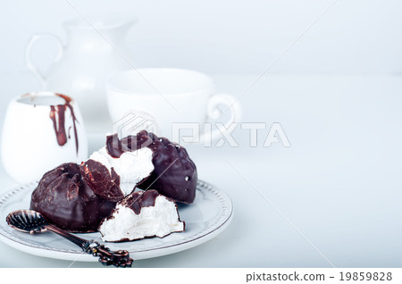 Chocolate  zephyr and cup of coffee  19859828