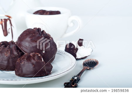 Chocolate  zephyr and cup of coffee  19859836