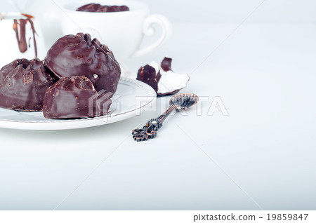 Chocolate  zephyr and cup of coffee  19859847