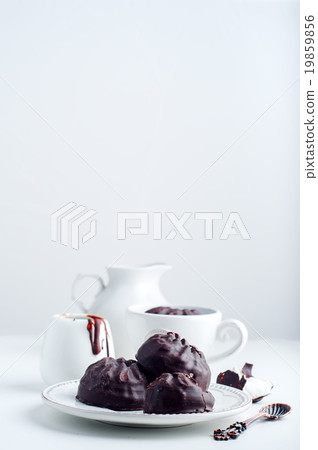 Chocolate  zephyr and cup of coffee  19859856