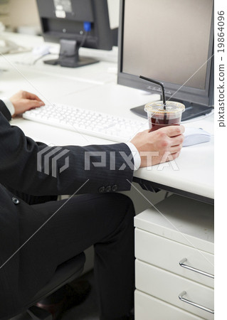 Businessman drinking convenience coffee Businessman drinking convenience coffee 19864096