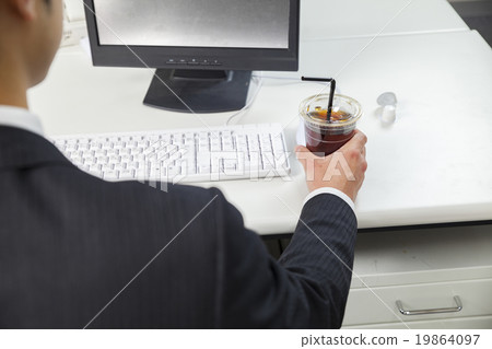 Businessman drinking convenience coffee Businessman drinking convenience coffee 19864097