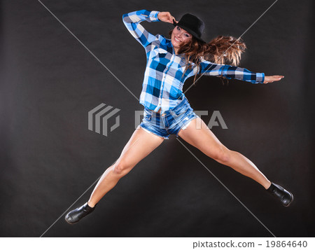 Happy and joyful woman girl jumping and having fun Happy and joyful woman girl jumping and having fun 19864640