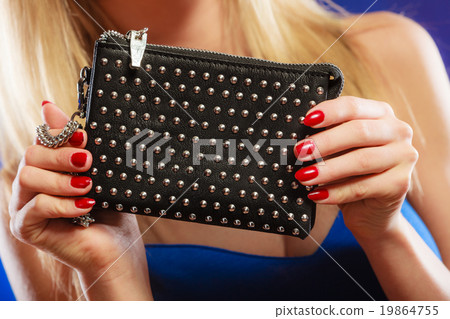 Evening handbag in woman hand Evening handbag in woman hand 19864755