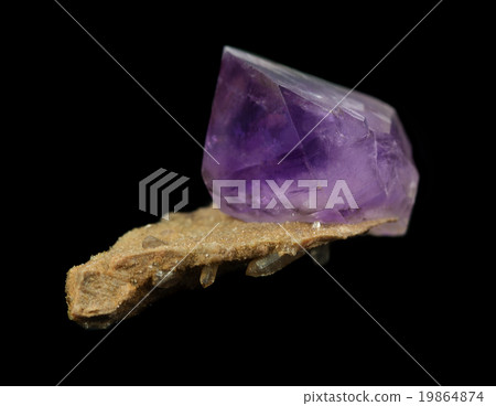 Amethyst crystal isolated on black Amethyst crystal isolated on black 19864874