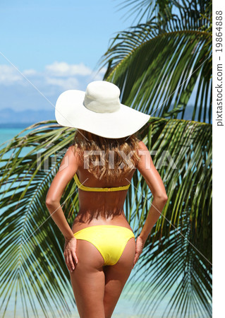 Woman on tropical beach 19864888
