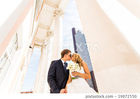 Wedding couple and skyscraper Wedding couple and skyscraper 19872550