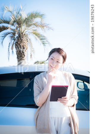 Drive beach tablet woman 19876243
