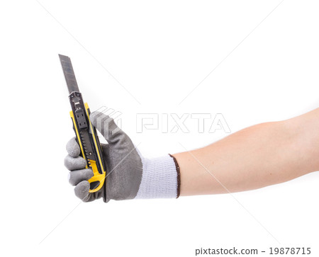 Hand in gloves holding knife. Hand in gloves holding knife. 19878715