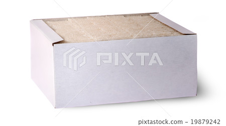 In front white sugar cubes in a box In front white sugar cubes in a box 19879242