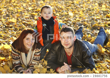 happy family taking a walk outdoors happy family taking a walk outdoors 19881756