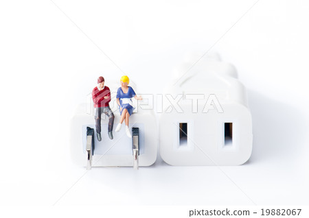 Outlet plug, male and female couple having a conversation 19882067