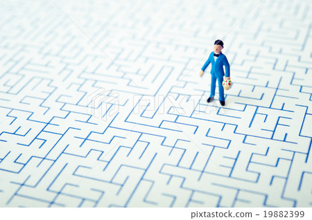 A child standing in a maze 19882399
