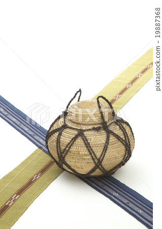 Tin and woven belt and seeds Tin and woven belt and seeds 19887368
