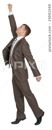Businessman with arm up Businessman with arm up 19891049