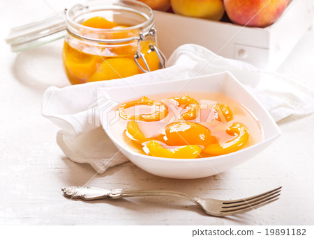 canned peaches in a bowl canned peaches in a bowl 19891182