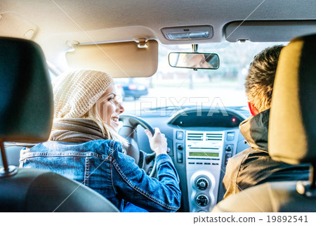 Woman driving a car Woman driving a car 19892541