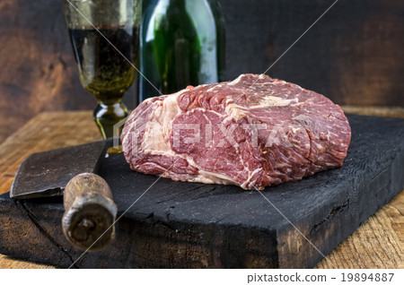 Dry aged Entrecote on Carbonized Wooden Board 19894887