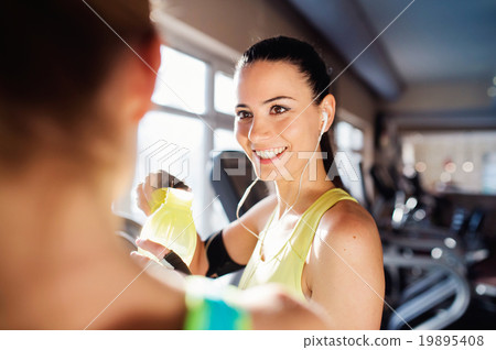 Beautiful women in gym 19895408