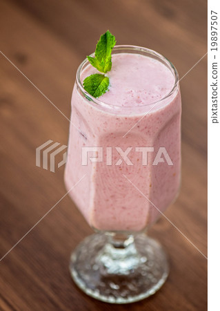 Strawberry smoothie on  table 19897507