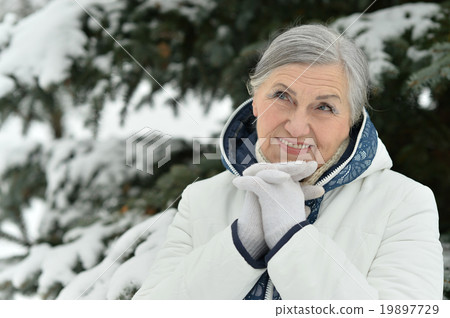 Old woman in the winter Old woman in the winter 19897729