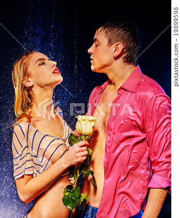 Couple  under  water drop. 19899598