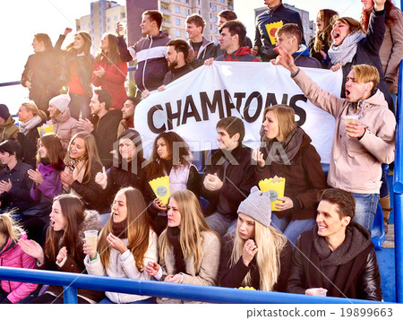 Sport fans holding champion banner on tribunes. Sport fans holding champion banner on tribunes. 19899663