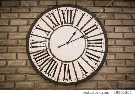 vintage clock on brick wall vintage clock on brick wall 19901805