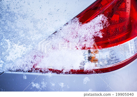 snow on a car light snow on a car light 19905040