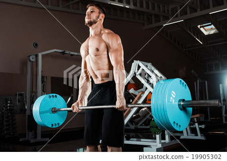 Muscular Man Lifting Deadlift Muscular Man Lifting Deadlift 19905302