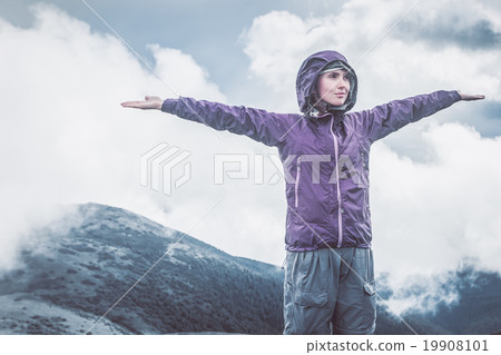Woman on top of a mountain 19908101